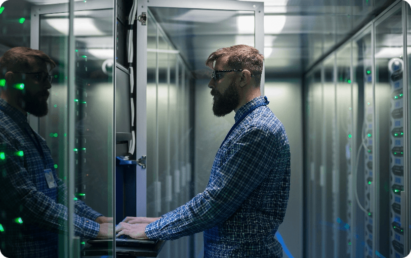 man at server room terminal