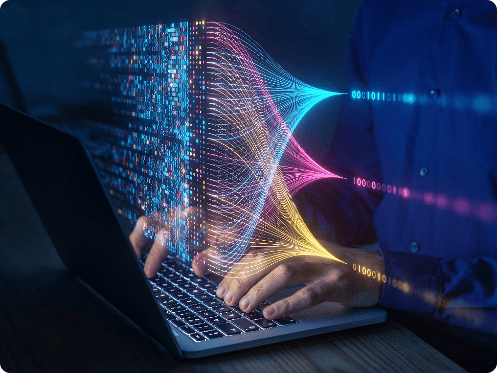Person typing on laptop with AI graphics floating above